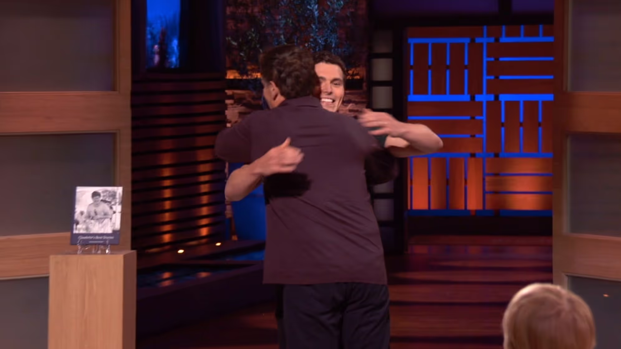 Photo of Mark Cuban smiling on the Shark Tank set