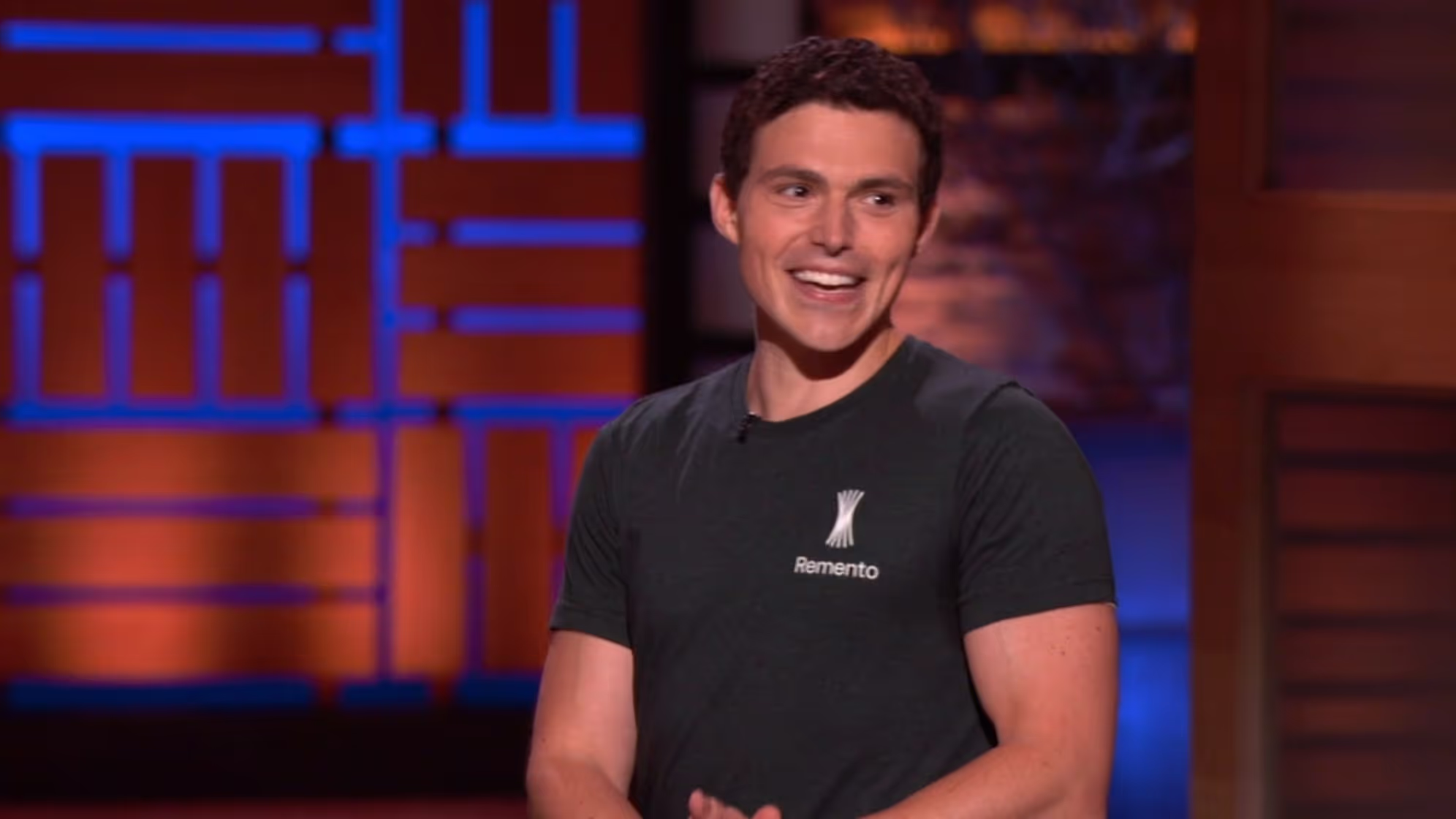 Photo of Mark Cuban smiling on the Shark Tank set