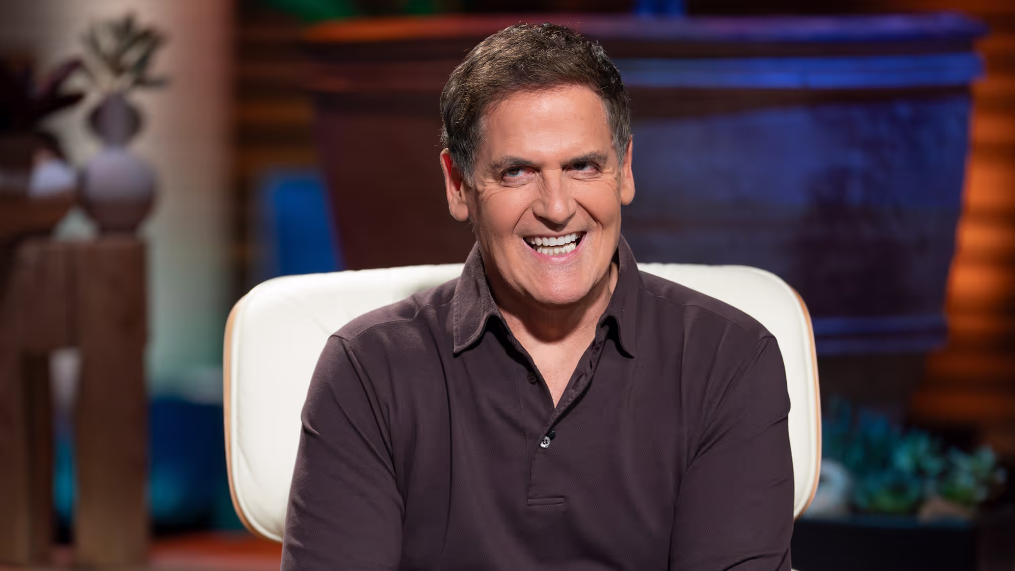 Photo of Mark Cuban smiling on the Shark Tank set