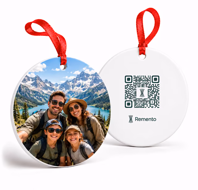 Family hiking selfie with mountains on a highlight of the year photo ornament and its QR code back