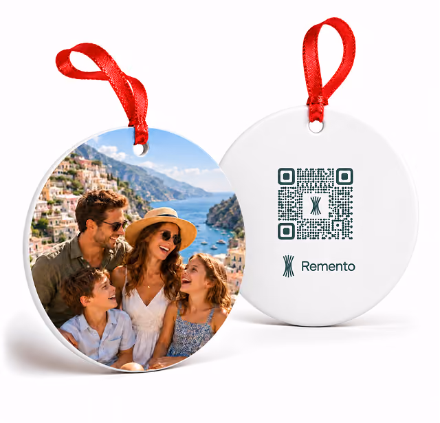 Family trip photo on a travel Christmas ornament with a coastal town view and QR code back