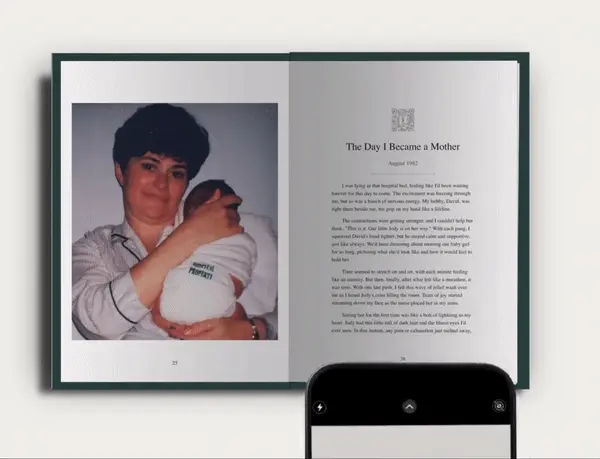 Phone scanning the QR code to open the story in the web interface